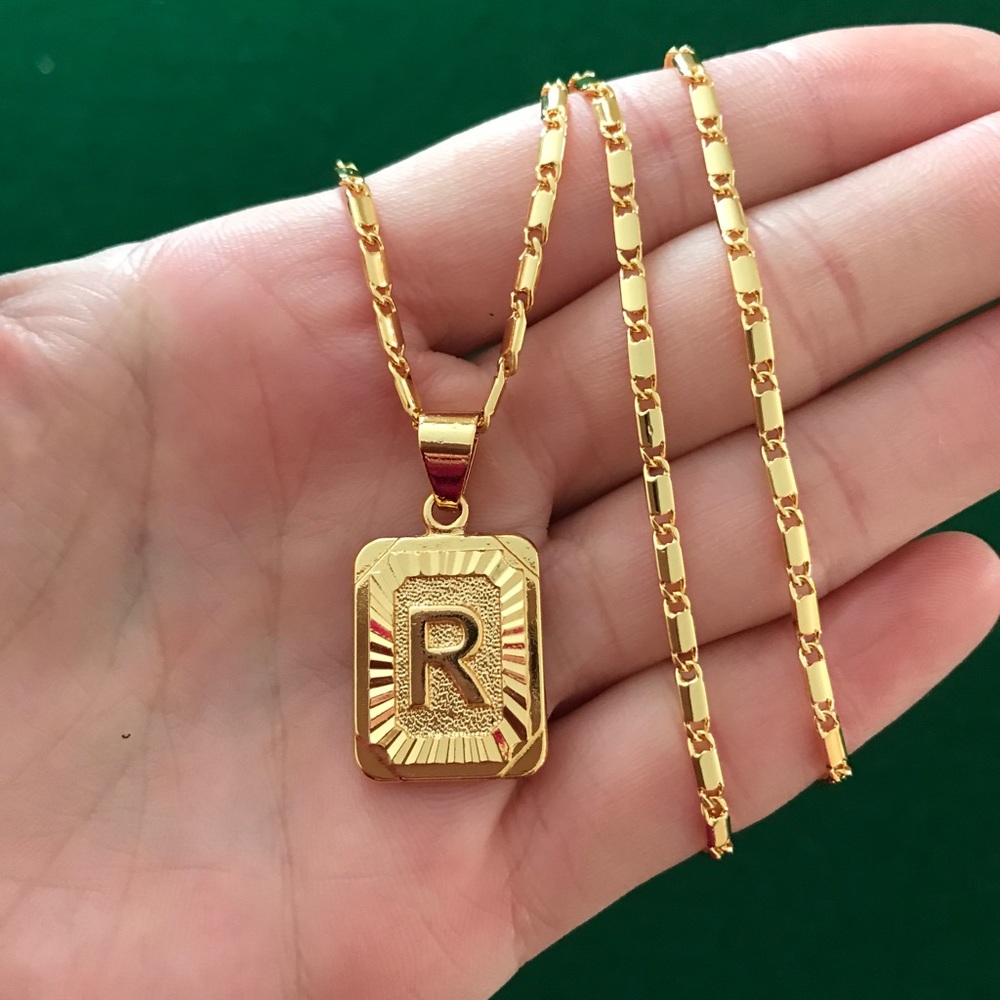 Brand new real 18k gold plated R “ necklace